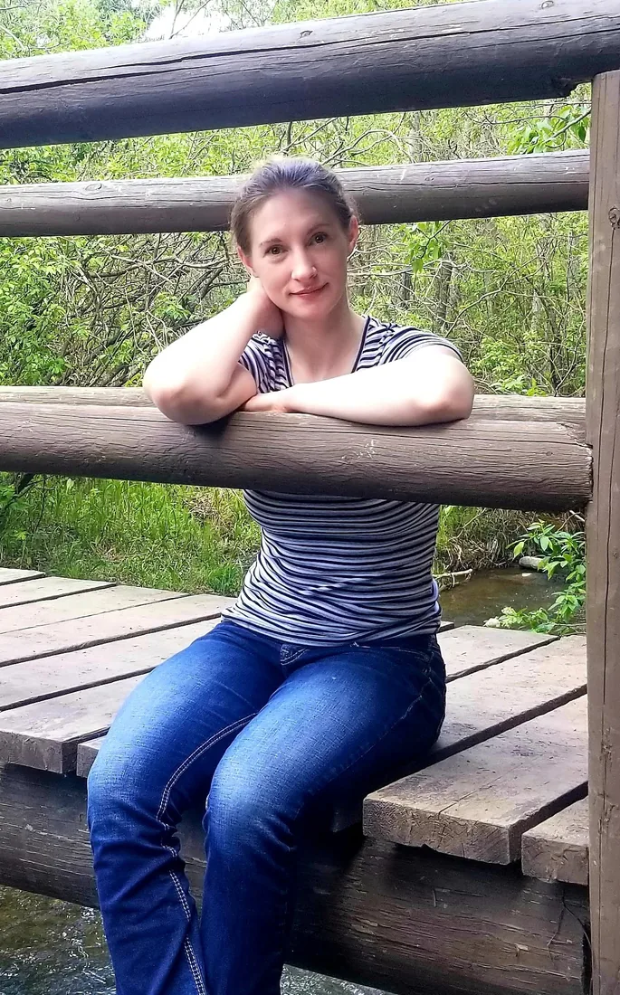 Chloe Fowler on a footbridge